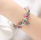 Bracelet Charme en Argent et perles de verre.
